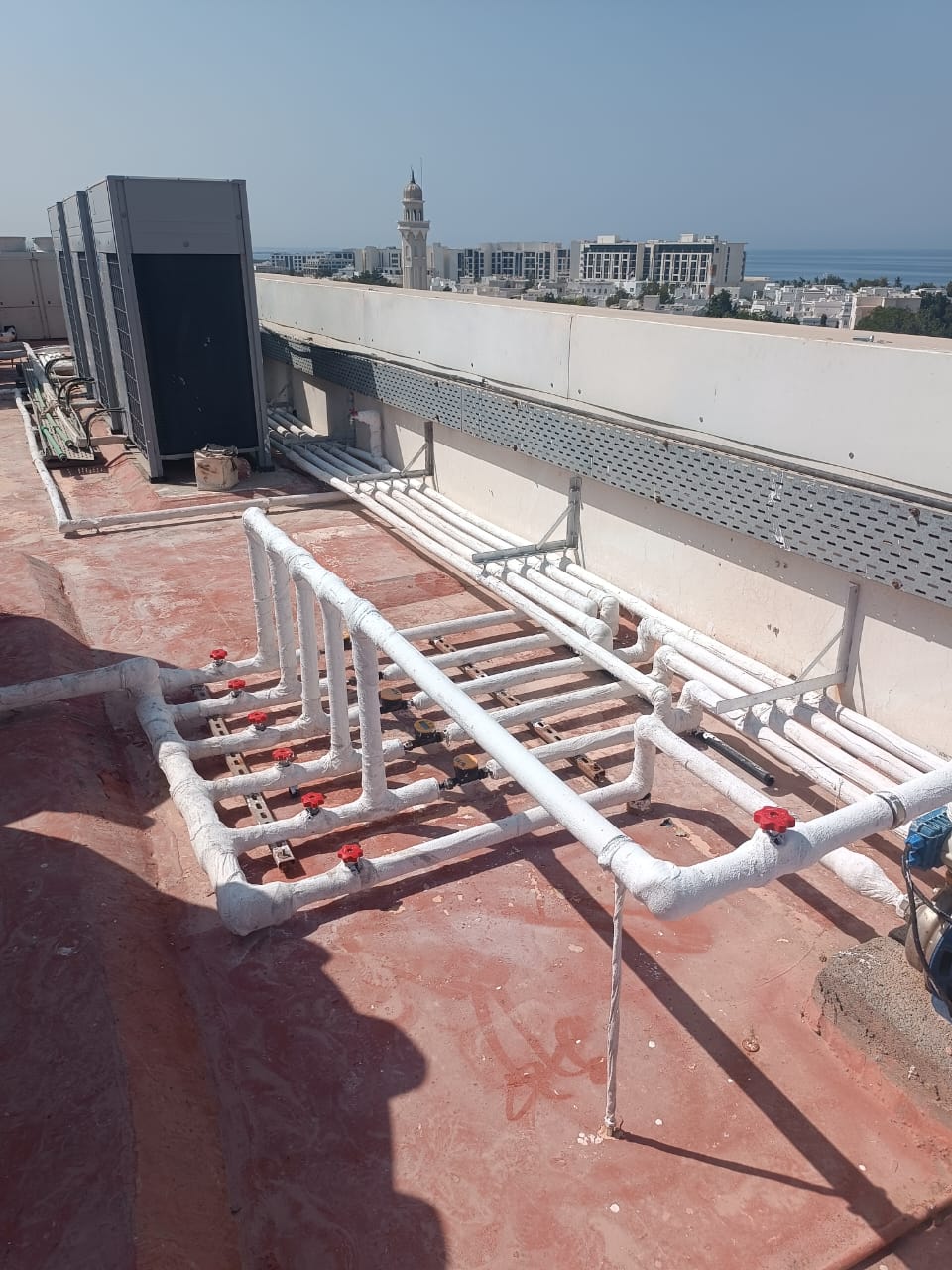 RNR technician fitting PRP pipelines at International Marble Gallery, Qurum